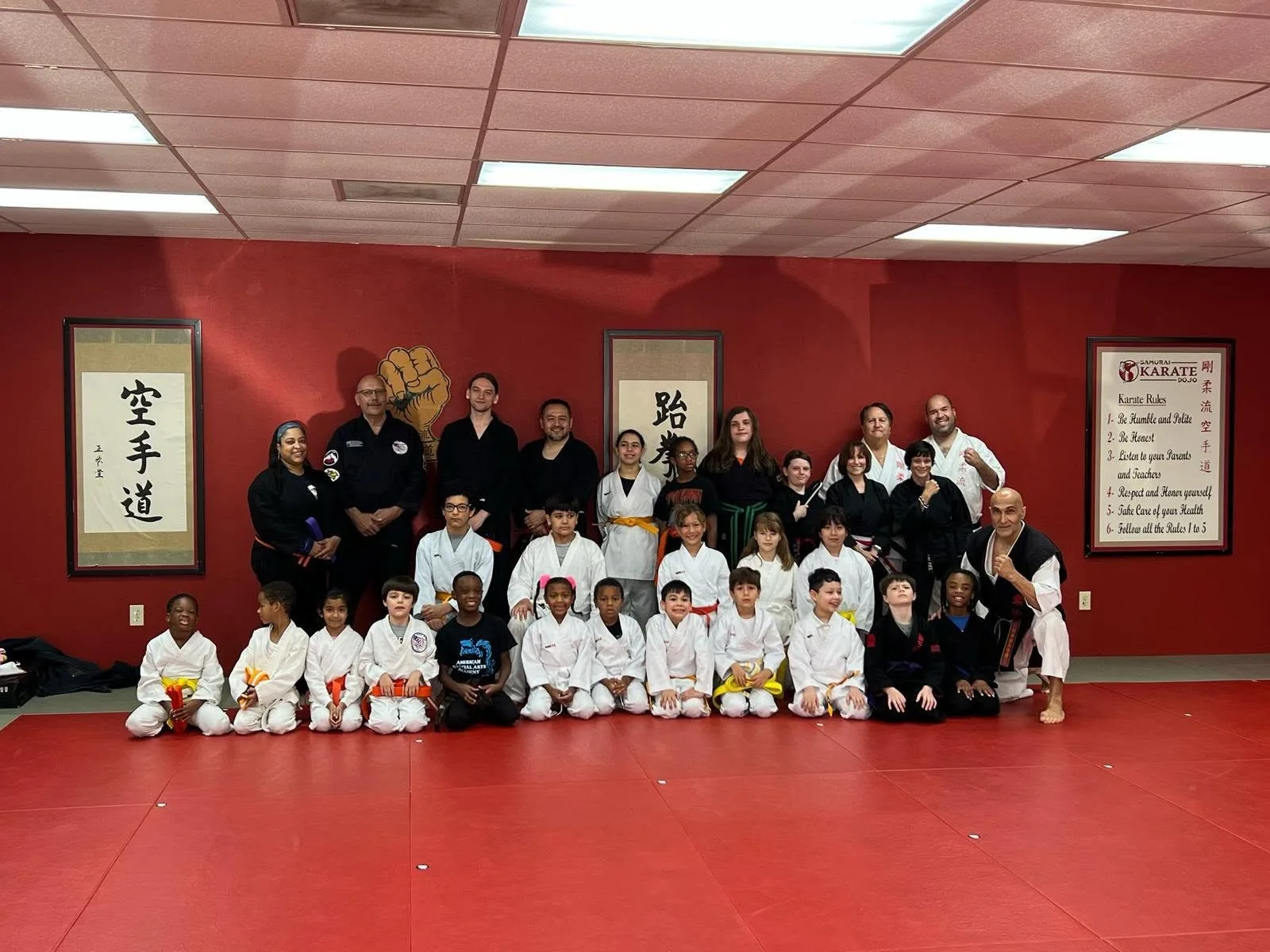 Students celebrating a belt promotion